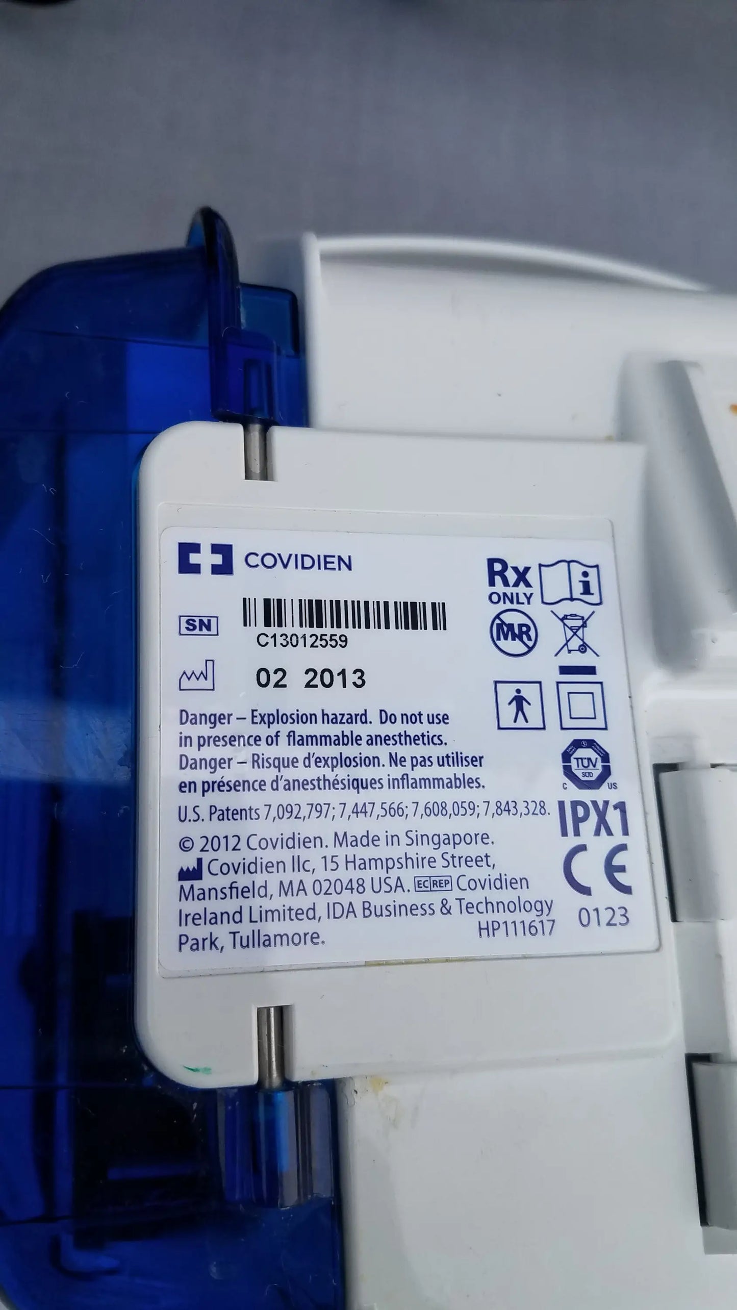 White plastic medical device label with blue and black text on covidien enteral feeding pumps compatible kangaroo epump