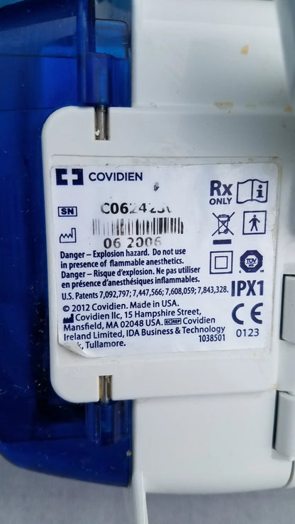 White plastic label with covidien branding and regulatory markings on the back of compatible kangaroo epump enteral feeding device