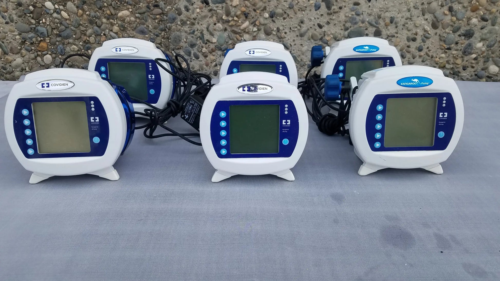 Lot of 6 covidien enteral feeding pumps with white and blue kangaroo epump design and pole clamps compatible kangaroo