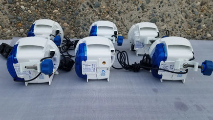Lot of 6 covidien enteral feeding pumps with white and blue plastic bodies, black cords, and compatible kangaroo epump design