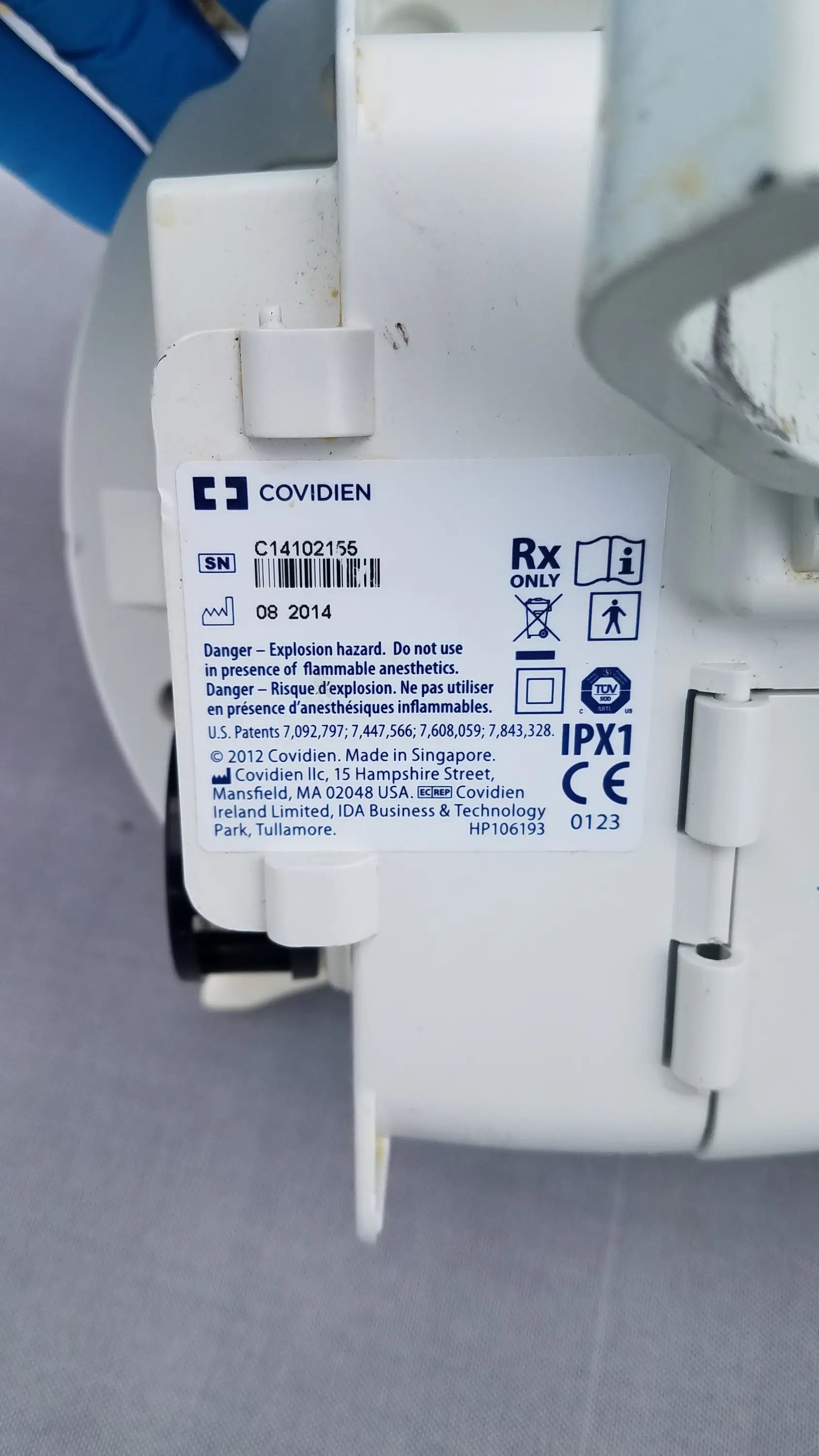 White plastic covidien kangaroo epump enteral feeding pump with regulatory markings and serial number visible