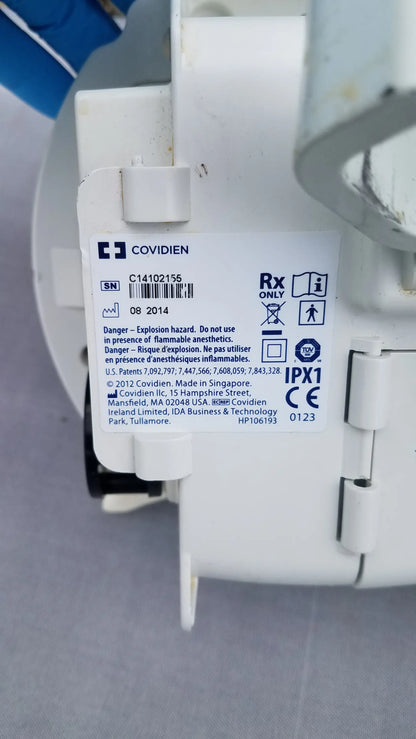 White plastic covidien kangaroo epump enteral feeding pump with regulatory markings and serial number visible