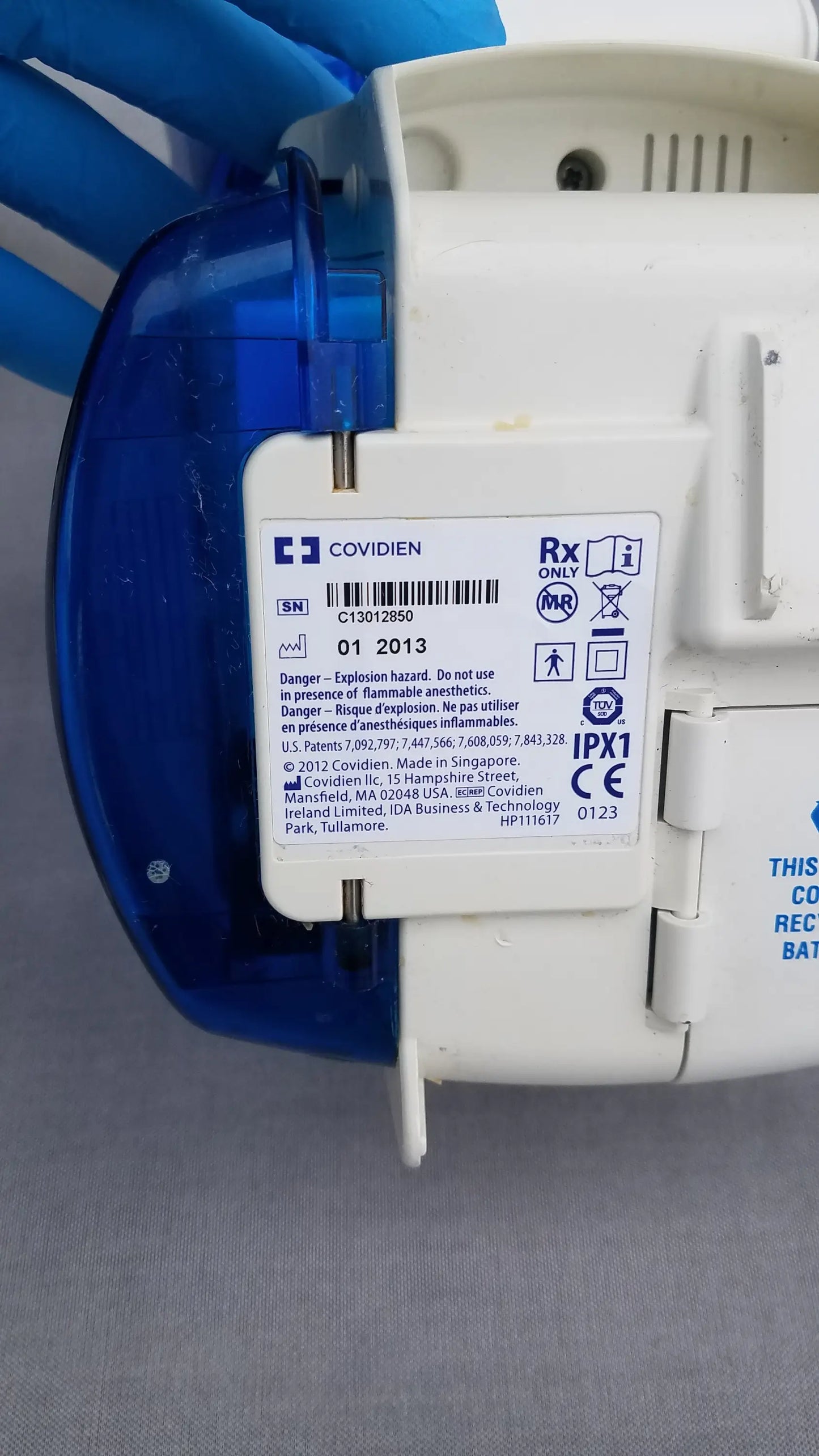 White and blue Covidien kangaroo epump enteral feeding pump featuring rx only and CE certification labels