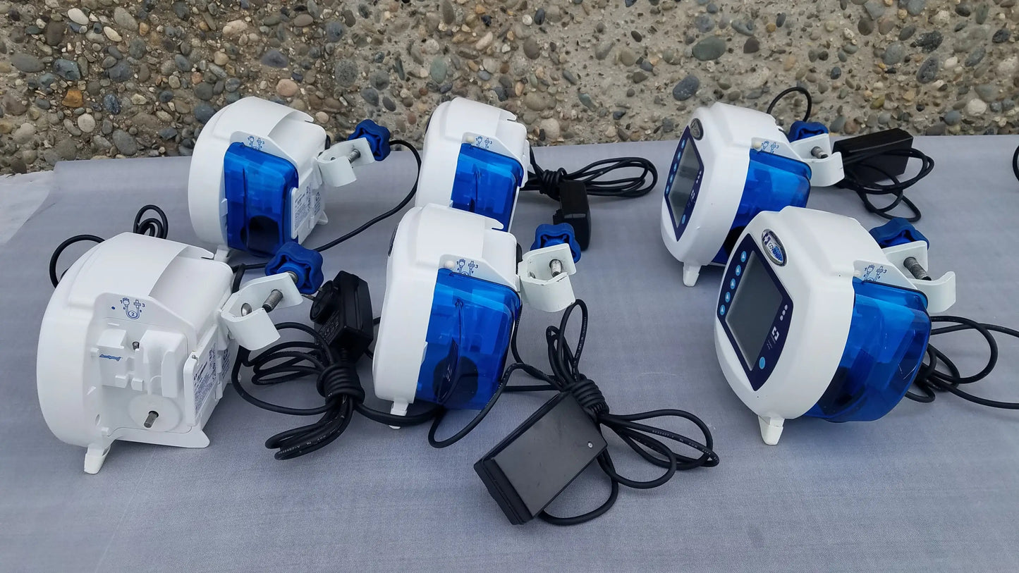 Lot of 6 white and blue kangaroo epump enteral feeding pumps with digital displays pole clamps and power supplies