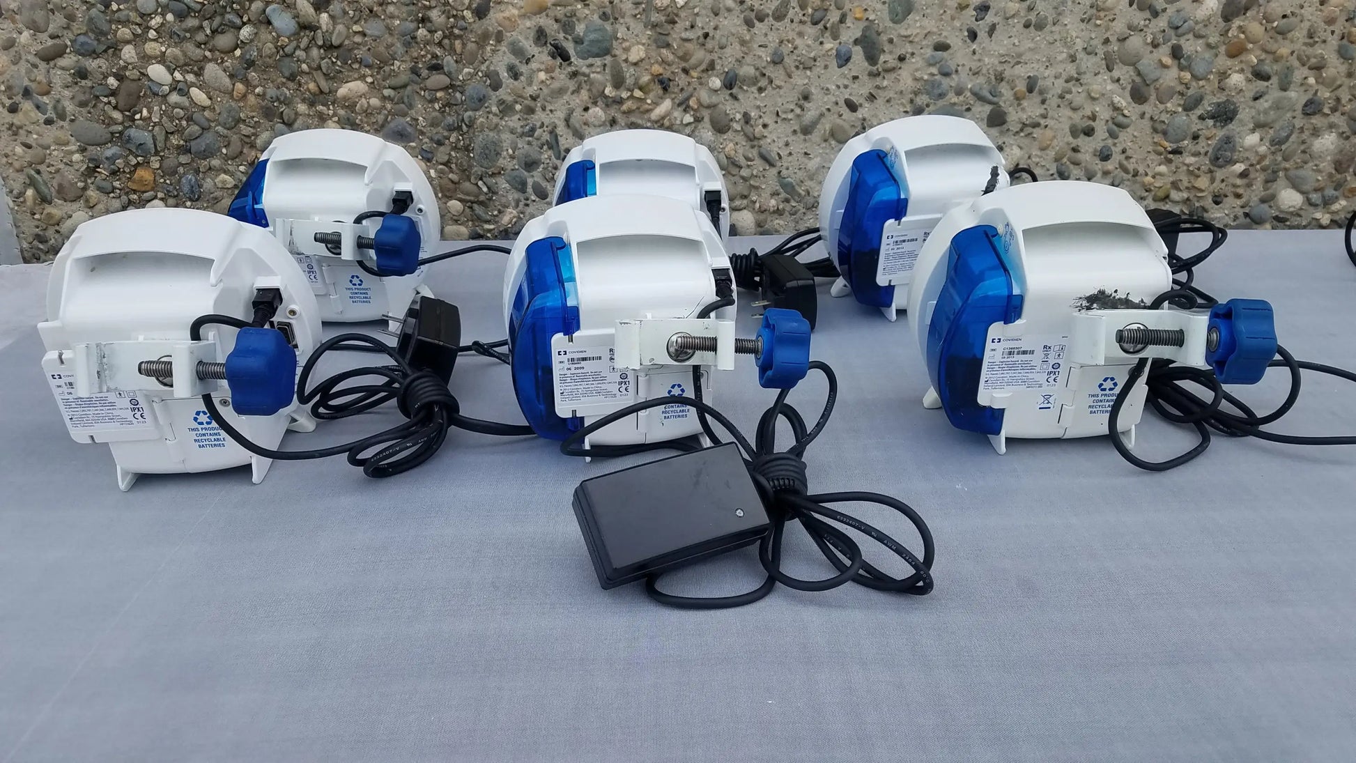Lot of 6 white and blue kangaroo epump enteral feeding air pump units with black power cords and pole clamps compatible kangaroo