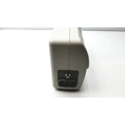 Beige plastic low air loss mattress pump with black panel and silver knob for air loss mattress control