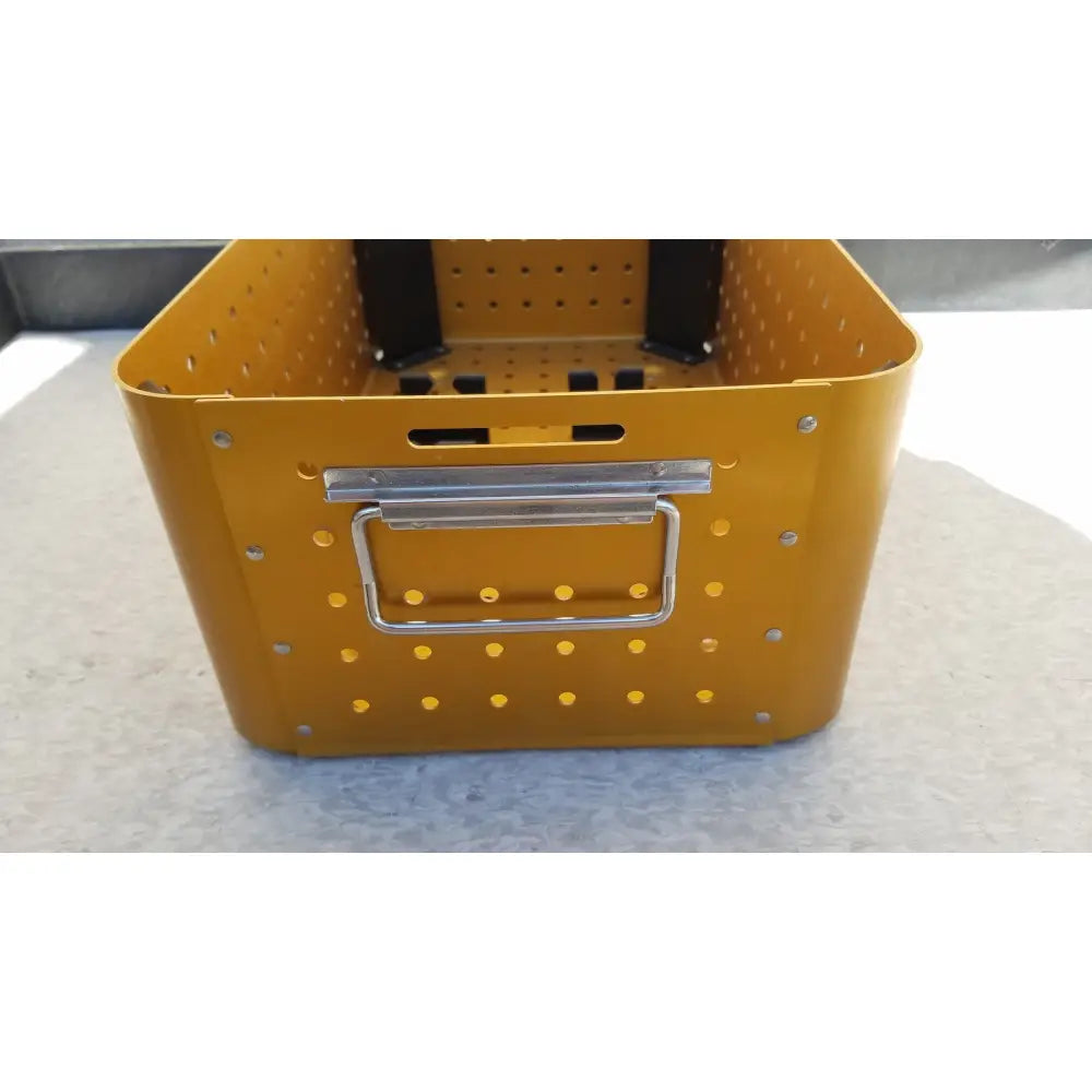Yellow perforated metal lubricant diffuser housing perforator driver storage bin with silver handle empty case only
