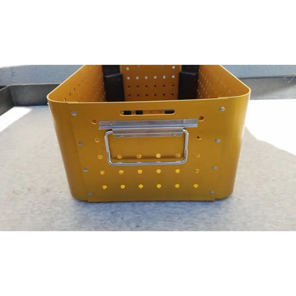 Yellow perforated metal diffuser housing perforator storage bin with silver handle for housing perforator driver empty case
