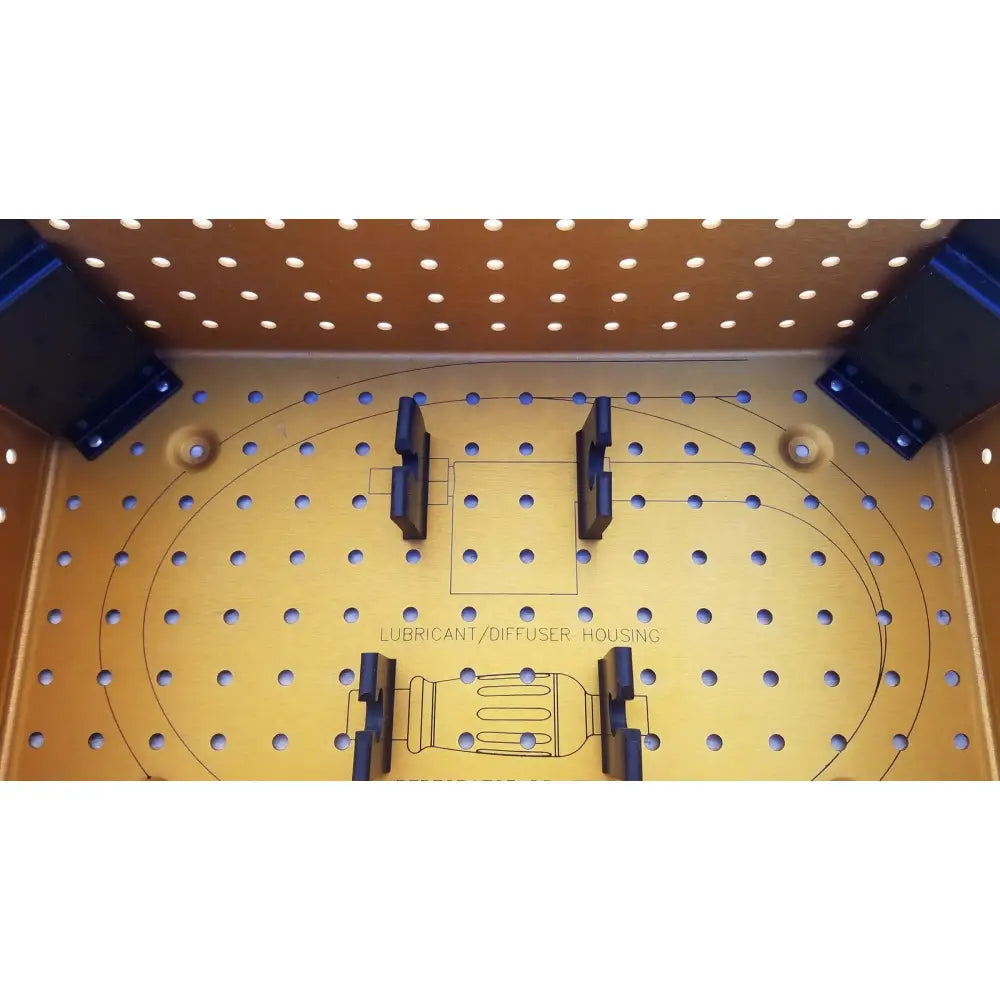 Yellow metal perforated diffuser housing perforator panel with black plastic mounting brackets and engraved lubricant diagram