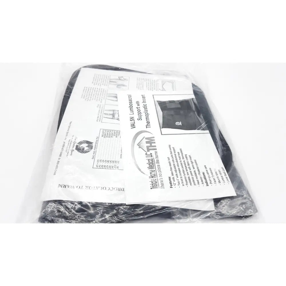 Black sacral orthosis val5n medium with thermoplastic insert packaged in clear plastic wrap for lumbosacral support
