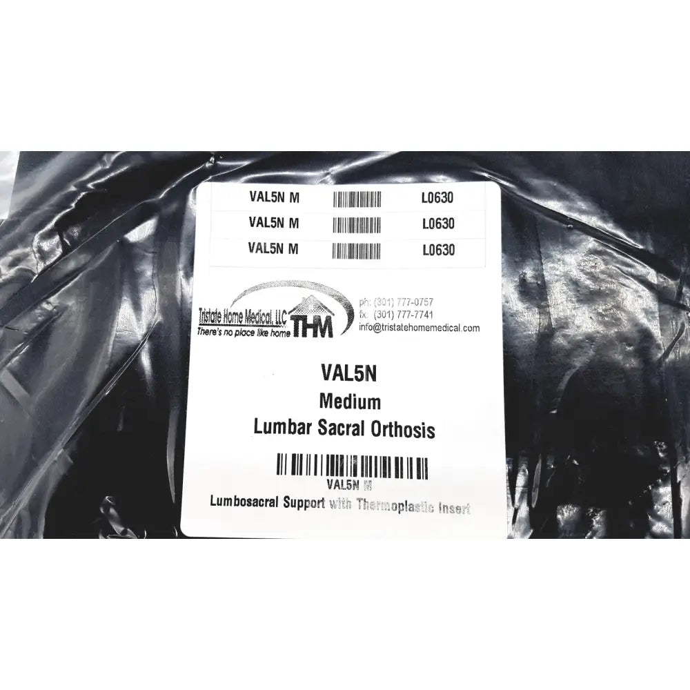 White label on black plastic packaging for tristate home medical sacral orthosis val5n medium lumbosacral support