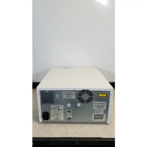 White rectangular luminex 200 xmap multiplex ruo system back panel with vented casing and multiple labeled ports for reuse medical applications