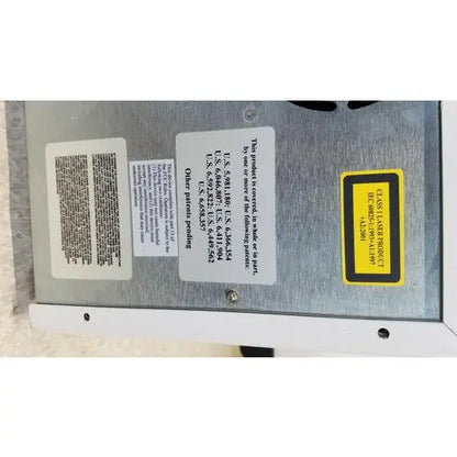Silver metallic industrial laser engraver with class 1 yellow warning label on luminex 200 xmap multiplex ruo system