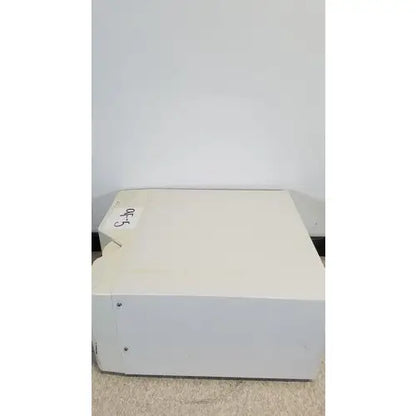Off-white rectangular luminex 200 xmap multiplex ruo system with angled top and visible screws for reuse medical applications
