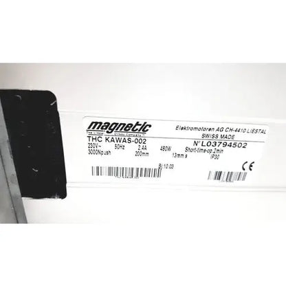 White rectangular label with black text and barcode on magnetic elektromotoren liestal actuator linear actuators