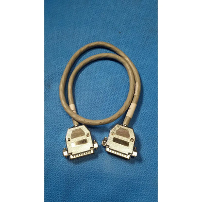 Beige coiled data cable with two metallic male pin connectors for pin connector data transmission