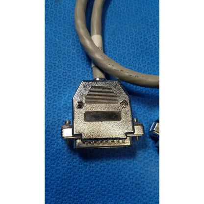 Gray cable with metallic rectangular male pin connector featuring textured surface and screw holes for pin connector data use