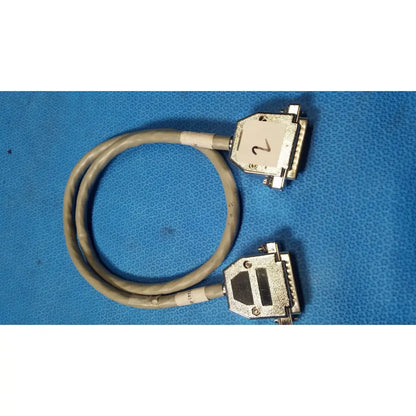 Gray coiled male pin connector data cable with two metallic d-sub connectors one labeled 2 for secure connections