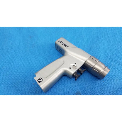 Silver stryker surgical instrument with textured grip and metallic barrel for patient cable 4ft use by masimo lnc-04