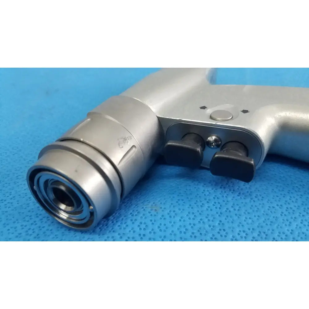 Silver-colored pneumatic impact wrench with black trigger and adjustment knobs shown alongside masimo lnc-04 patient cable 4ft