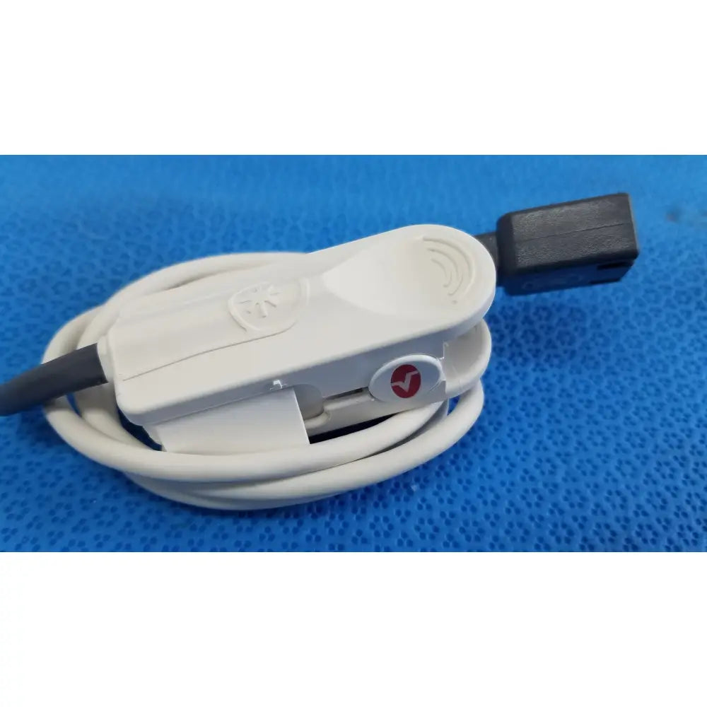 White plastic masimo lncs dci adult spo2 finger clip sensor with black connector and circular red logo
