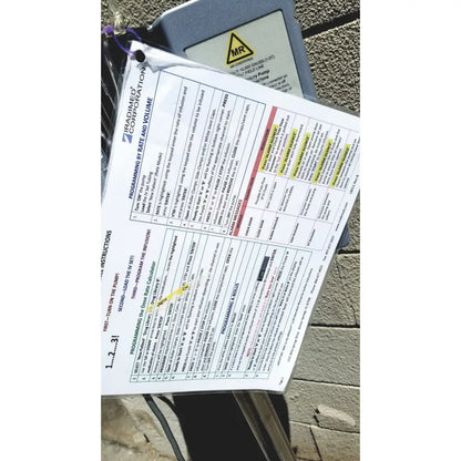 A white paper document with yellow highlights labeled programming by rate and volume for Masimo Mridium 3600 plus mri infusion pump monitoring systems
