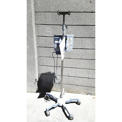 Masimo mridium 3600+ silver and white medical iv stand with four caster wheels for mri infusion pump monitoring systems