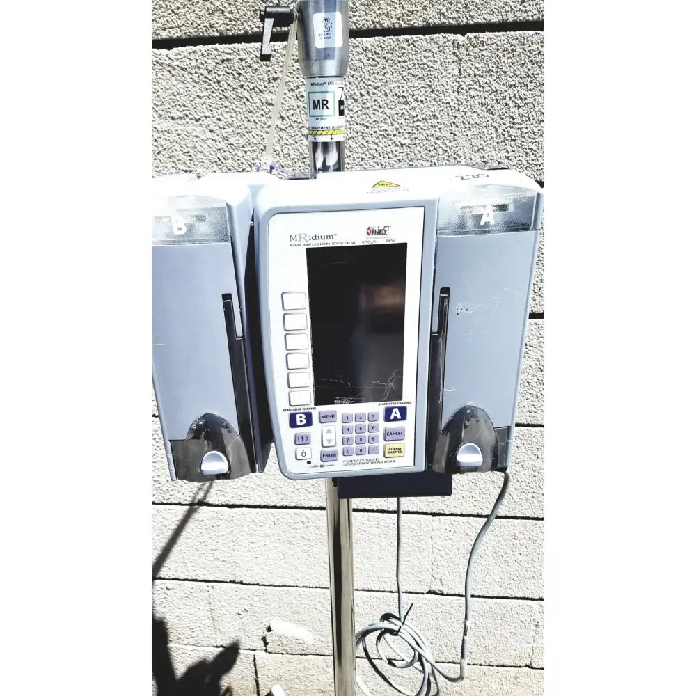 Gray medtronic mri infusion pump with digital display and control buttons for infusion pump monitoring systems