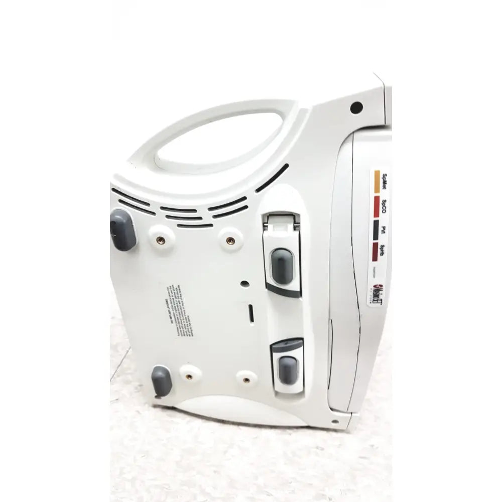 White plastic masimo radical-7 signal pulse oximetry touch color patient monitor with gray buttons and single-use label