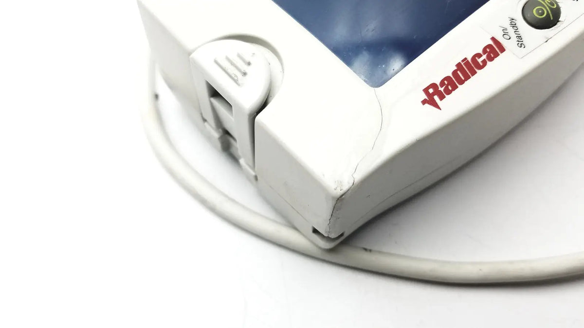 White masimo set radical signal extraction pulse oximeter on standby with blue screen and red branding untested model