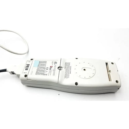 White plastic masimo set radical pulse oximeter back panel with coiled cable and labeled radical signal extraction specs