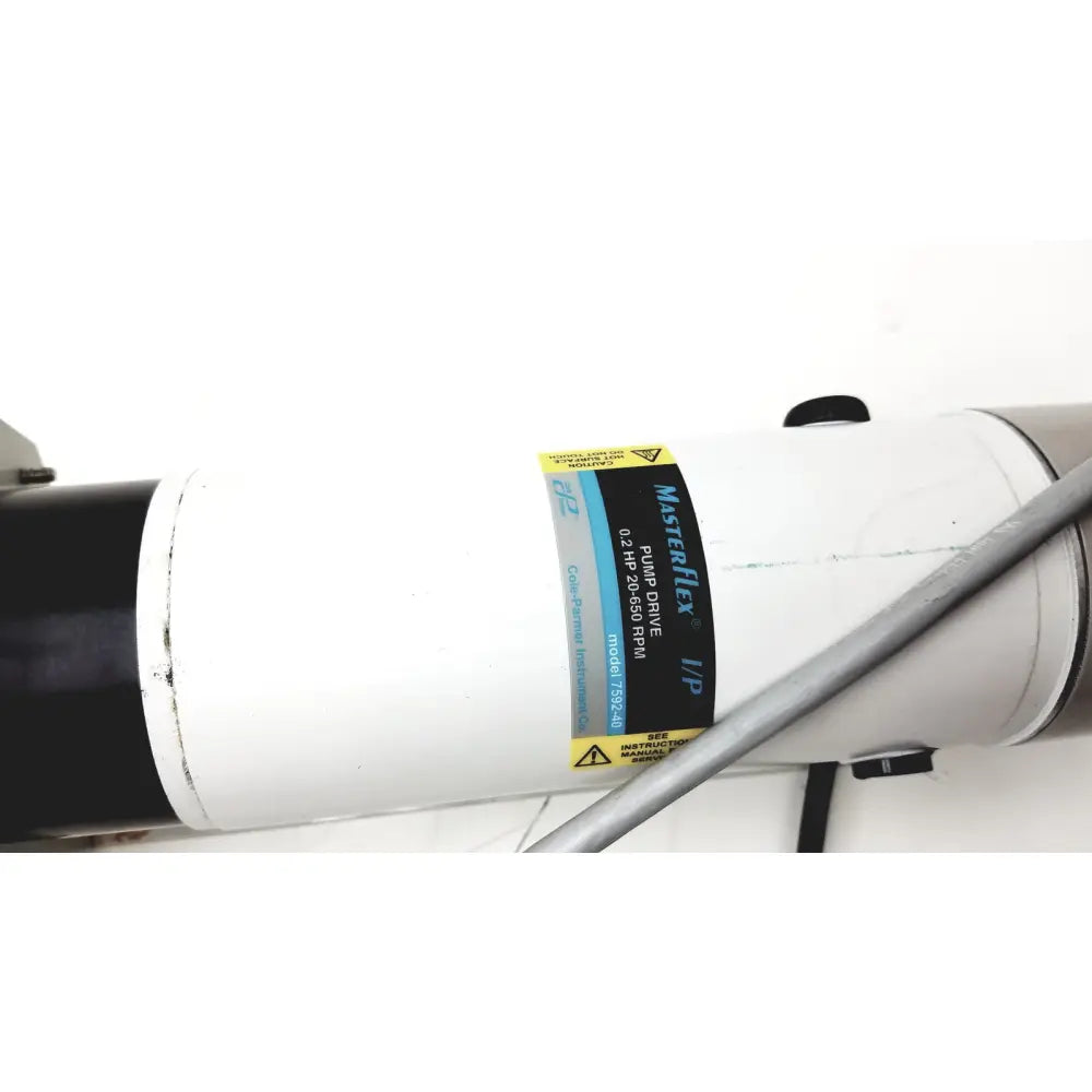 White cylindrical masterflex digital modular drive with black end caps and yellow-blue model label for pump drive