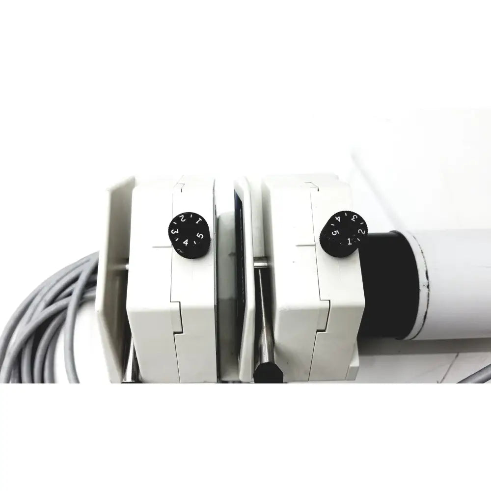 White plastic MasterFlex digital modular drive unit with black dual rotary thermostat dials marked 1 to 5