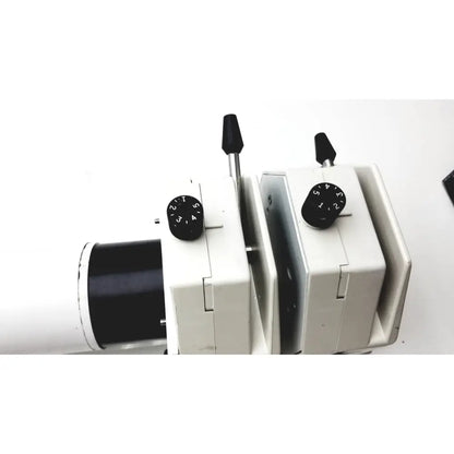 White plastic microscope with black adjustment knobs on masterflex i p digital modular drive modular drive unit