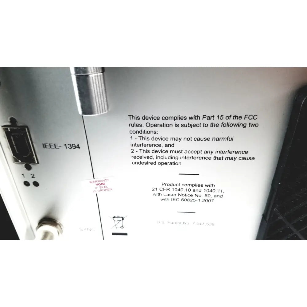 White plastic mauna kea technologies f400-v2 cellvizio console with black text and silver metallic connector on the side