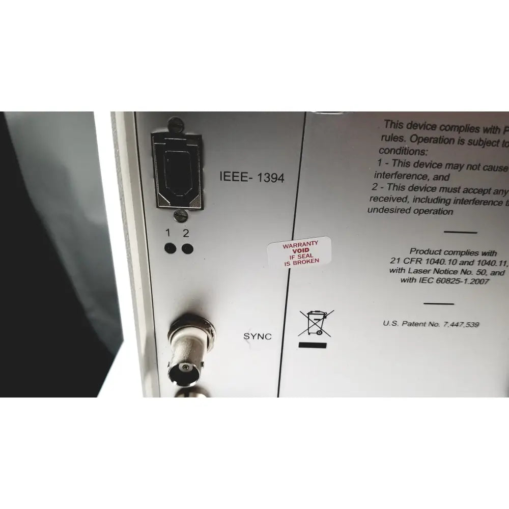 White metal panel with black labeled ports and sync knob on the back of mauna kea technologies f400-v2 cellvizio console