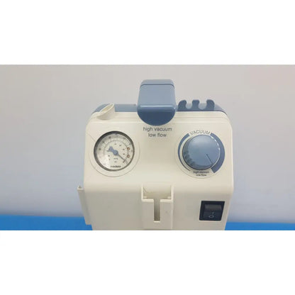 White and blue Medela Vario 18 suction pump aspirator with pressure gauge vacuum dial and control switch portable unit