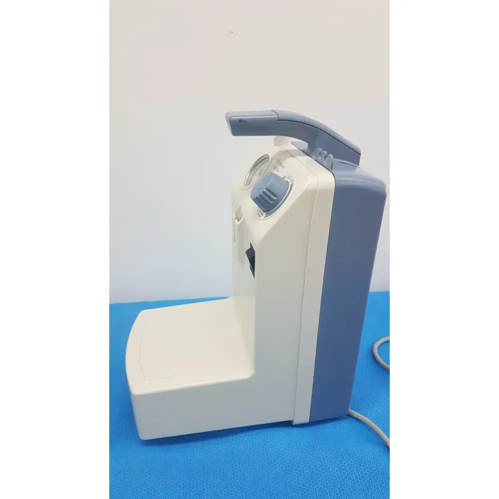 Medela vario white and blue suction pump aspirator with handle control dial and outlet port for medical use