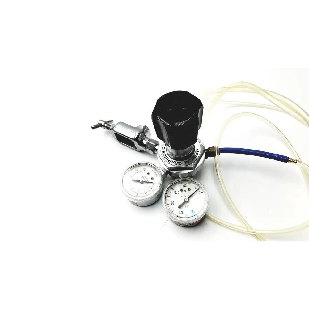 Black and chrome medical graphics corp comprressed gas regulator with two pressure gauges blue hose and clear tubing
