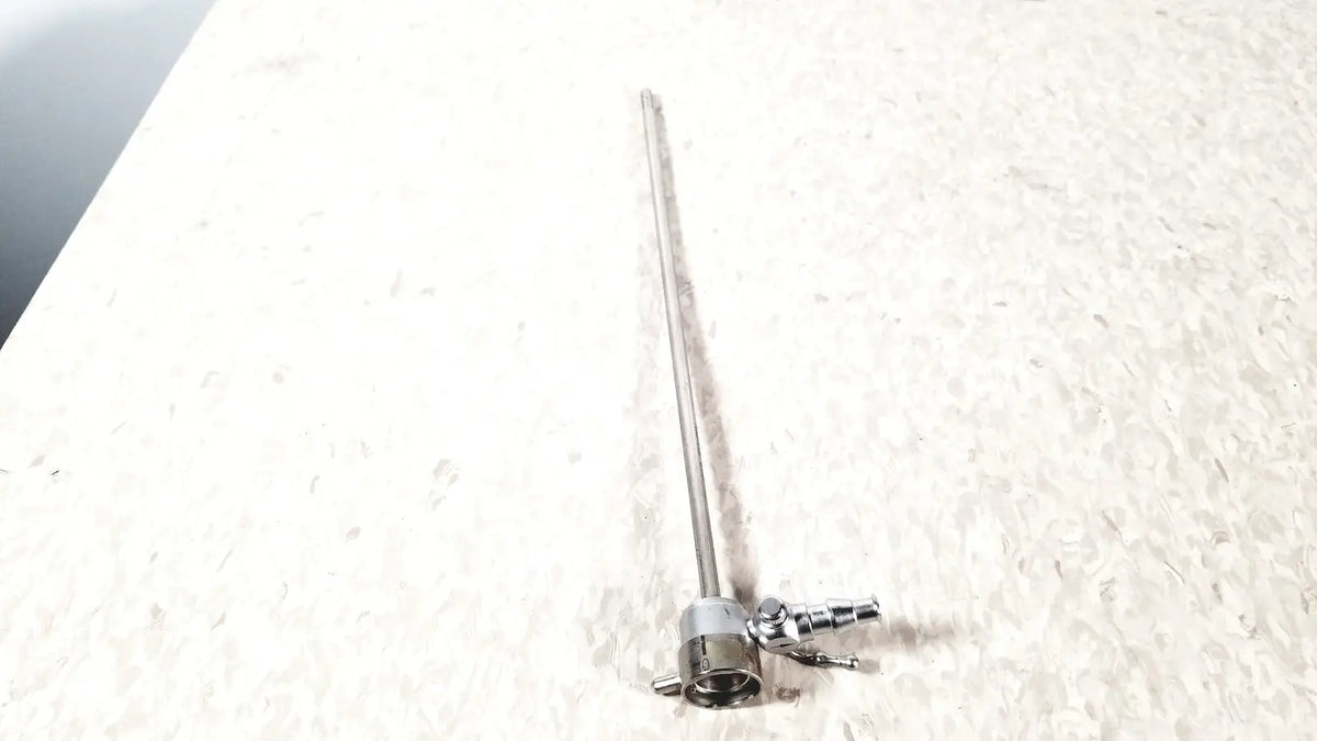 A metallic slender medical horizon endoscope single valve sheath with a cylindrical shaft and complex jointed base connectors