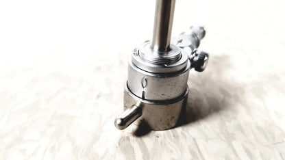 Silver-colored metal gas regulator with threaded connections and knobs for medical horizon endoscope single valve sheath