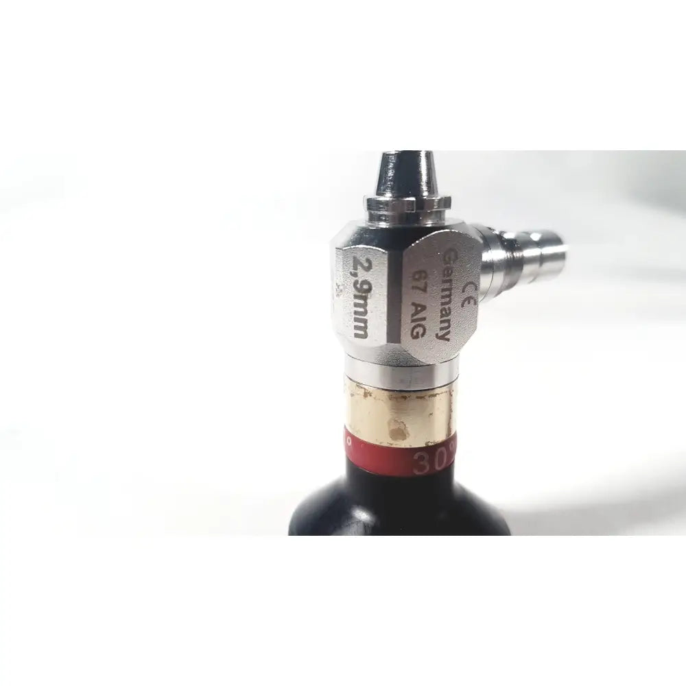 Silver hexagonal medical horizons 23-3064 30 degree hysterroscope telescope with black base and brass-colored band