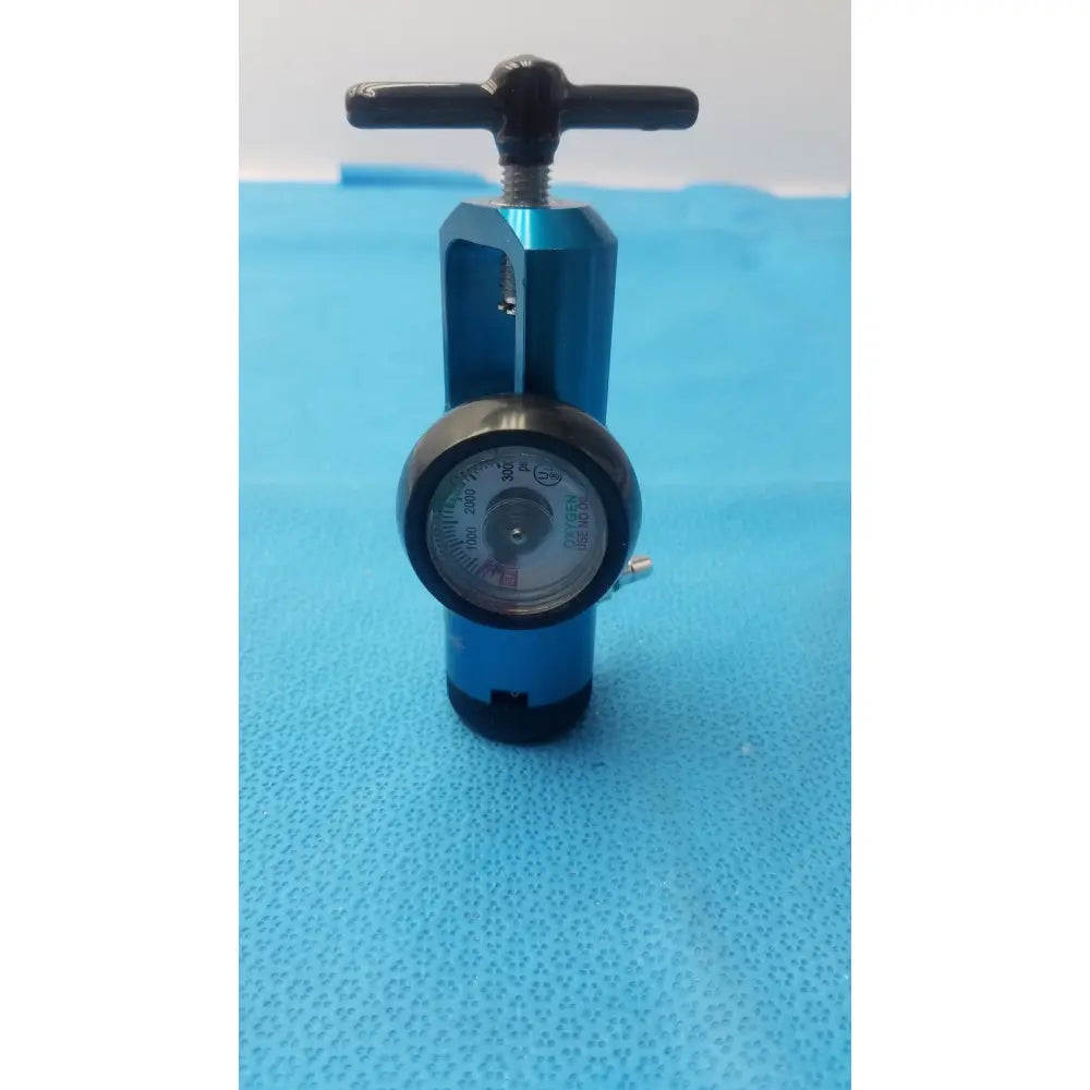 Blue metallic medical oxygen barbed regullator with black handle and circular gauge for 3000 PSI 3500m use