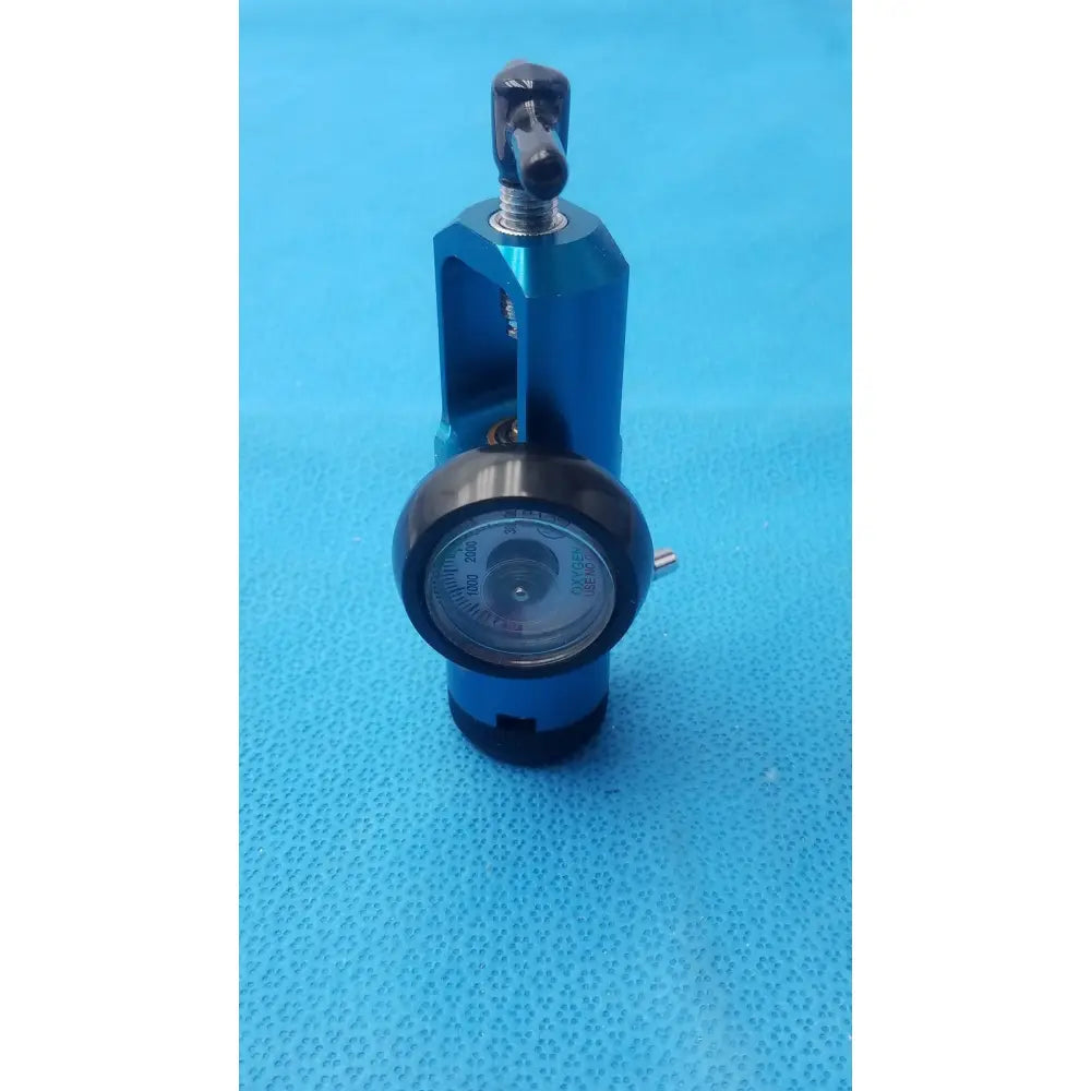 Blue anodized aluminum medical oxygen barbed regullator with black pressure gauge and knob for 3000 PSI use