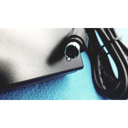 Black textured medical power supply with circular connector and coiled cable for covidien kangaroo feeding pump