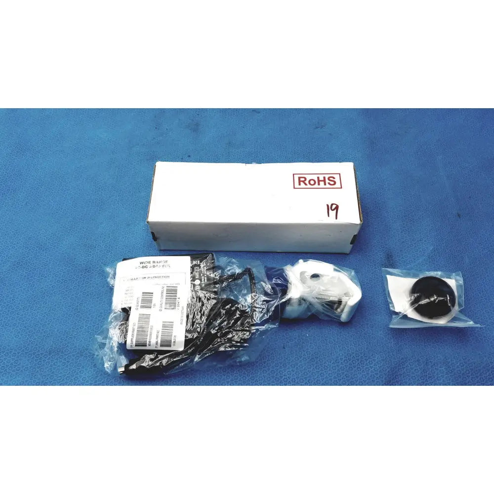 White rectangular medical power supply box with red rohs label and number 19 for covidien kangaroo feeding pump