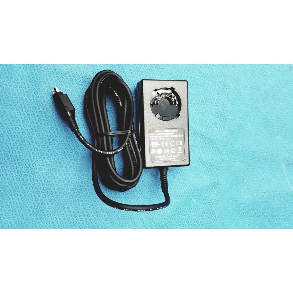 Black rectangular medical power supply with coiled cable and usb-c connector for covidien kangaroo feeding pump