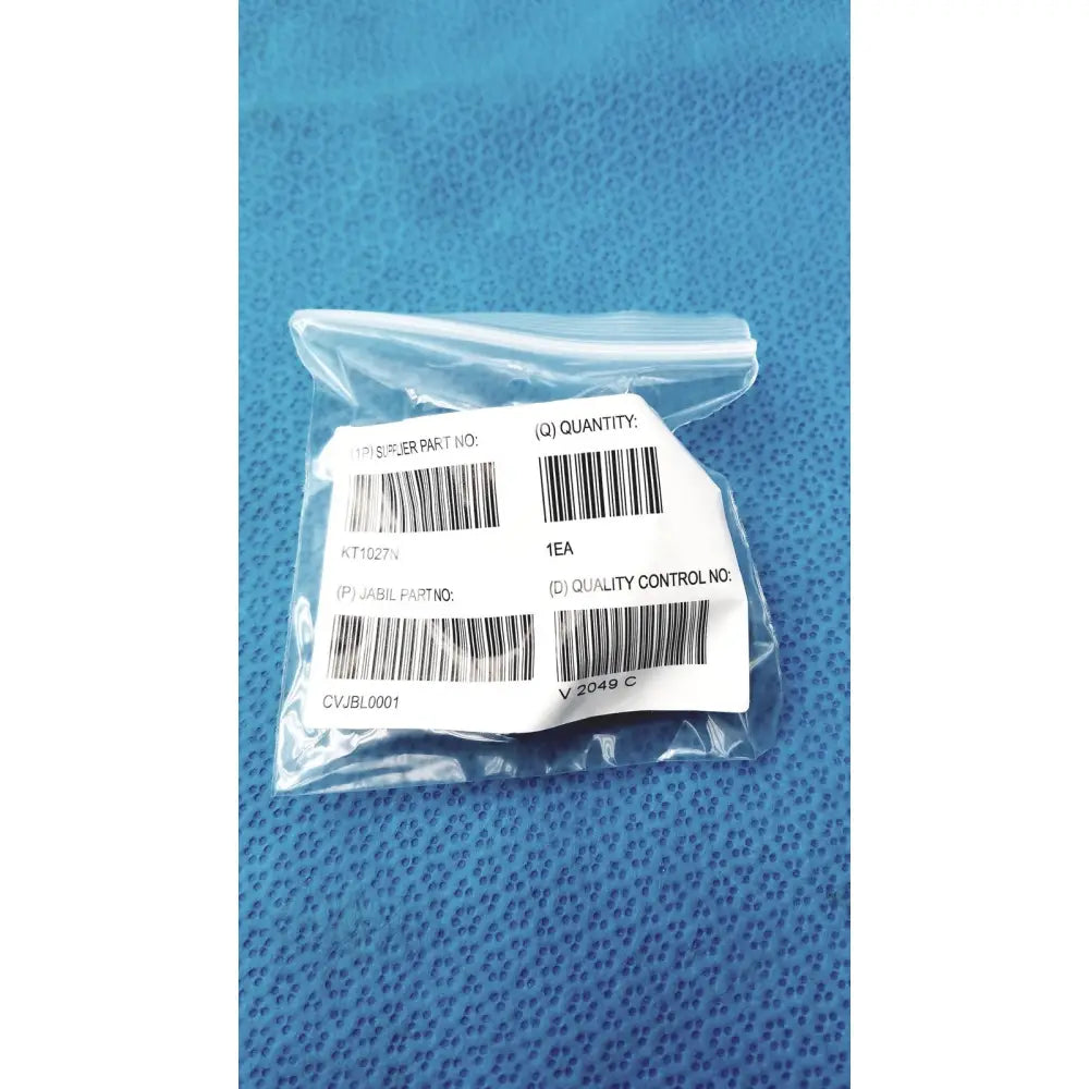 A clear plastic bag containing a white label with black text and barcodes for medical power supply covidien kangaroo feeding pump