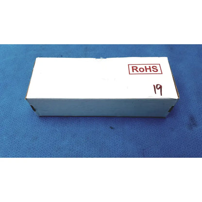 White cardboard box with red rohs stamp and black handwritten 19 for medical power supply covidien kangaroo feeding pump