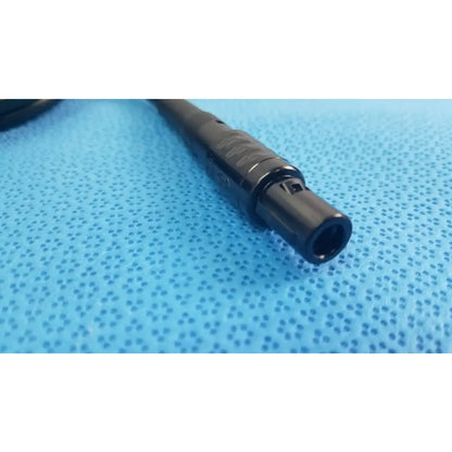 Black plastic xlr console extension cable connector with textured grip and threaded locking for surgical handpiece use in medical equipment